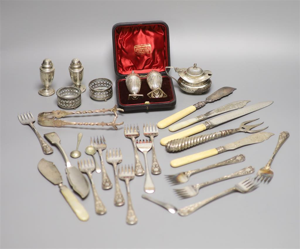 A cased pair of Victorian silver peppers, Sheffield, 1891, 79mm, five other silver condiments, etc.